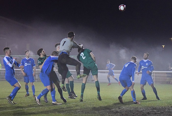 Frickley goalkeeper Sebastian Malkowski clears the ball