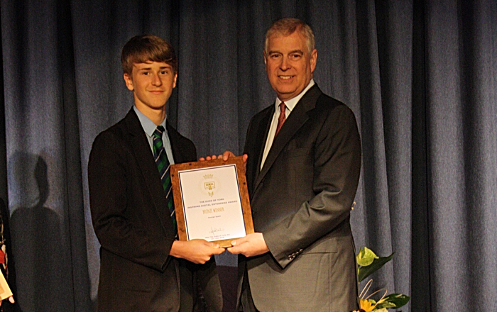 George Spain is presented with his Bronze certificate