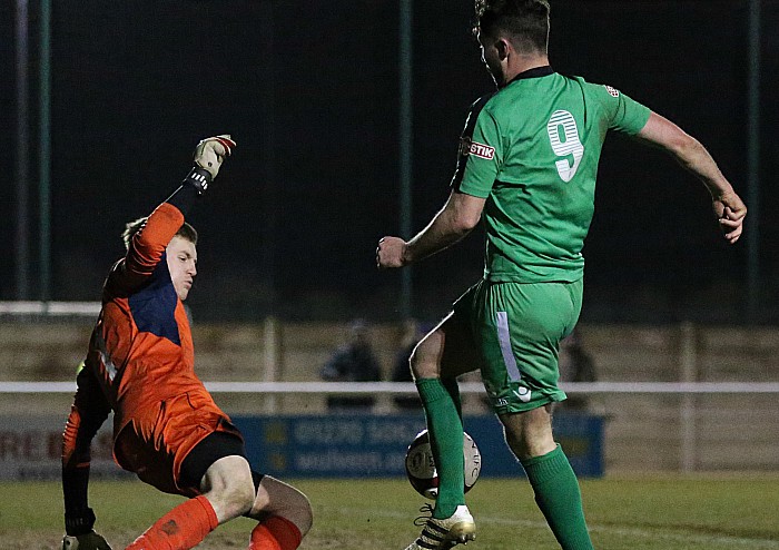 Harry Clayton shot is blocked by Stalybridge Celtic keeper Jack Walton