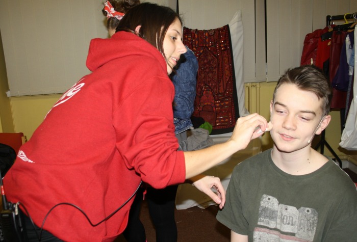 Fame - Hectic behind the scenes as Adam Boulton calmly allows Beth Redmayne to apply his stage make up