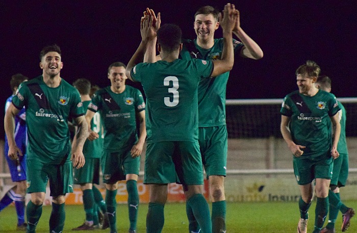 Ibou Touray celebrates his winning penalty goal with team mates - Nantwich reach Cheshire Senior Cup final