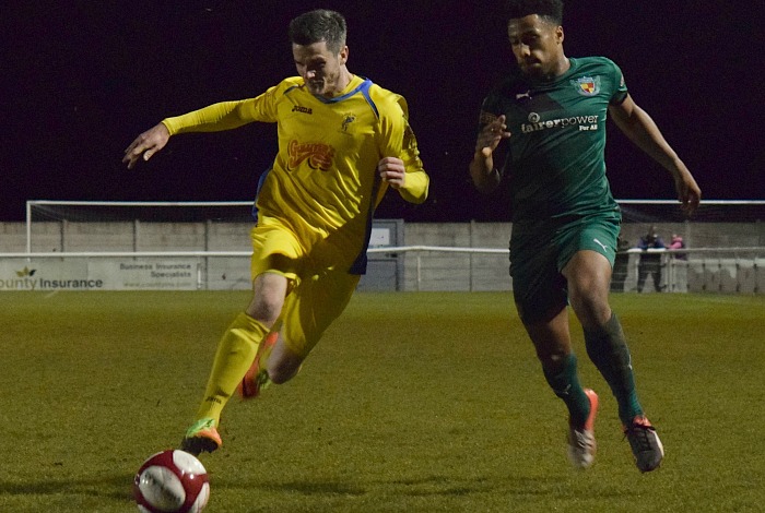 Ibou Touray challenges for the ball (1)