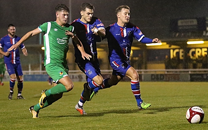 Jamie Morgan eyes the ball under pressure from Chasetown (1)