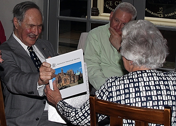 Jean Kay presents Herbert Rowsell and wife Jane with the commemorative book (1)