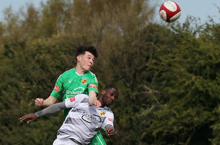 Joe Malkin and Prince Haywood fight for the ball (1)