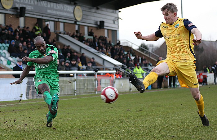 Joe Mwasile crosses the ball