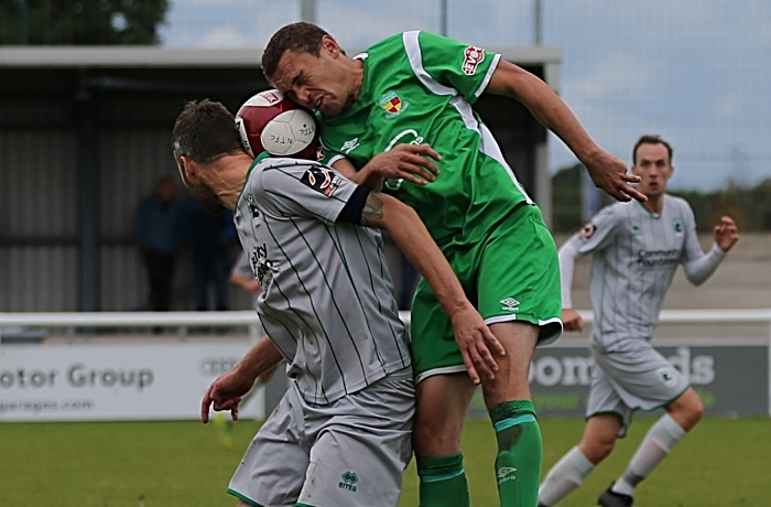 Joel Stair fights for the ball with Blyth captain Robbie Dale (1)