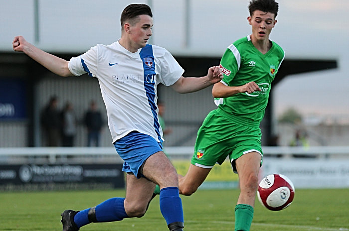 Keaton Webby clears the ball for Sandbach United