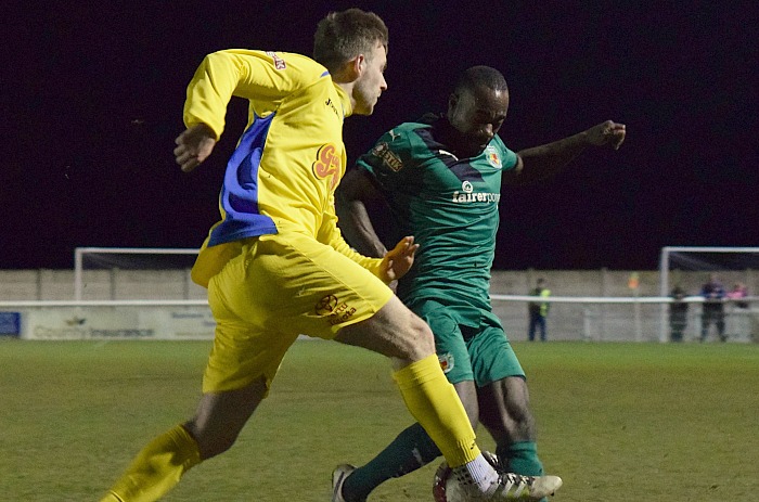 Man of the match Joe Mwasile attempts to block a clearance