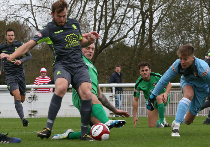 Man of the match Toby Mullarkey makes a goal-saving tackle