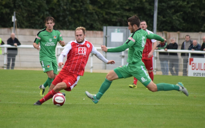 Matt Bell looks to get the ball