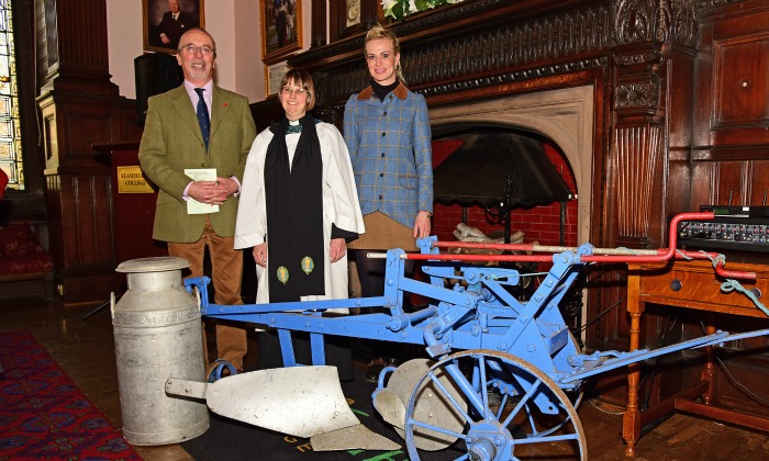 Meredydd David, Rev Anne Lawson and Georgina Lamb of RABI with plough, farming celebration