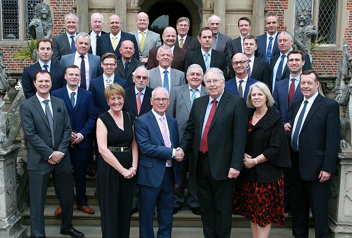 Mornflake managing director John Lea (front) says farewell to long-serving miller Paul Mellor during his retirement party at Crewe Hall