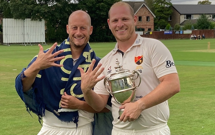 Nantwich CC players celebrate 5th league title - pic by Graham Pearson