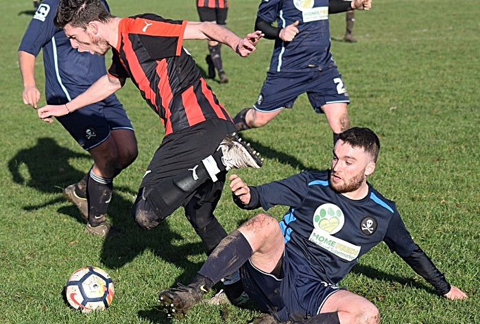 Nantwich Pirates player puts in a tackle