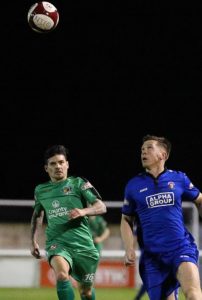 Nantwich Town Assistant Manager - player Danny Griggs and former Nantwich Town player Alex Frost eye the ball