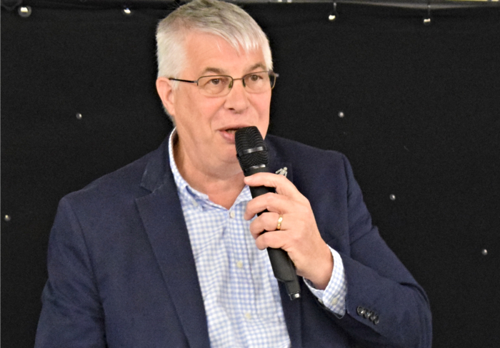 Nantwich Town Chairman Tony Davison addresses the audience