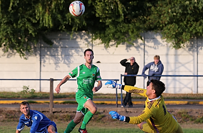 Nathan Cotterell’s powerful shot is parried by Winsford keeper Mike Langley (1)