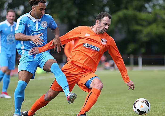 Nicky Maynard challenges Danny Higginbotham for the ball