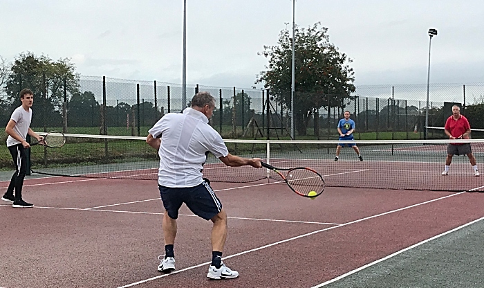 Open Doubles Final - Nick Green returns a serve from Paul Unwin (1)