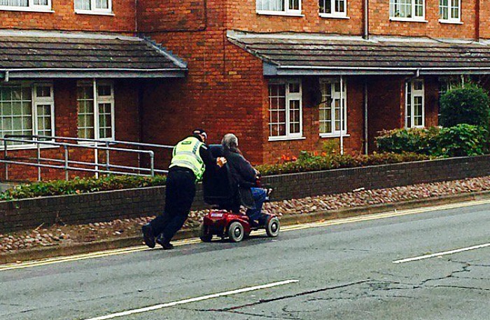 pc-marc-harley-pushed-broken-down-scooter-more-than-a-mile-home