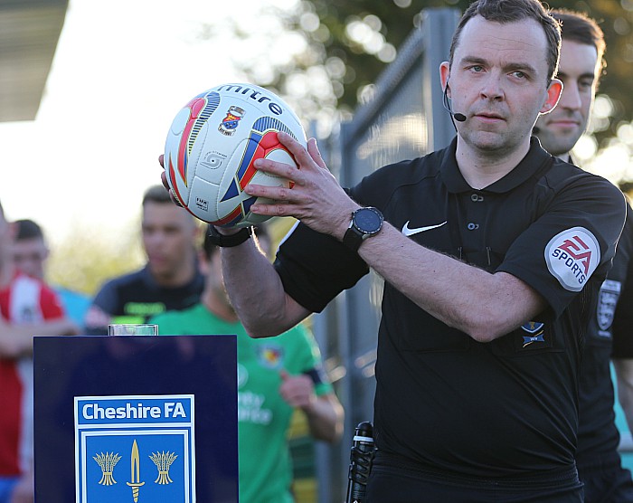 Pre-match - match referee lifts the match ball