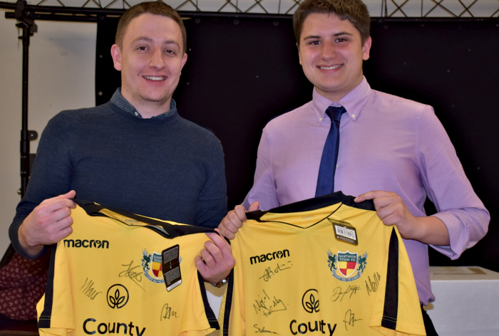 Press Officer Officer Steve Sharman - left - and Assistant Press Officer Ryan Batty receive signed shirts for their hard work over the season