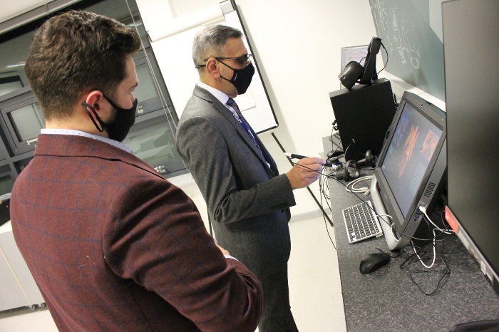 Digital superpowers - Principal & CEO of Cheshire College - South & West, Dhesi using the equipment