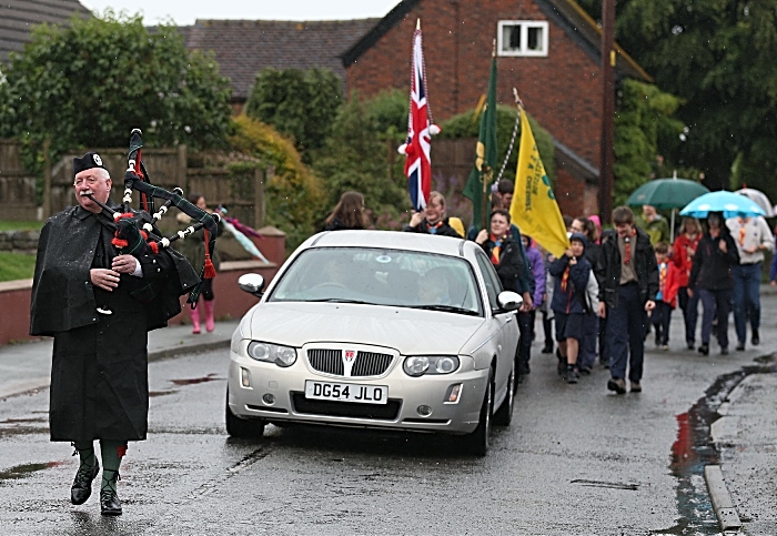 Fete - Procession along Church Lane led by Scottish Piper Reg Flower (1)