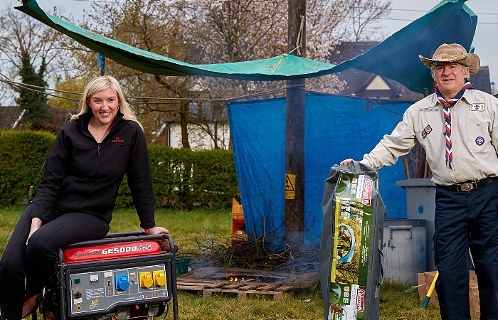 Scout - Redrow's Sarah Weaver with Scout leader Steve Bullock with some of the new equipment purchased with Redrow's donation