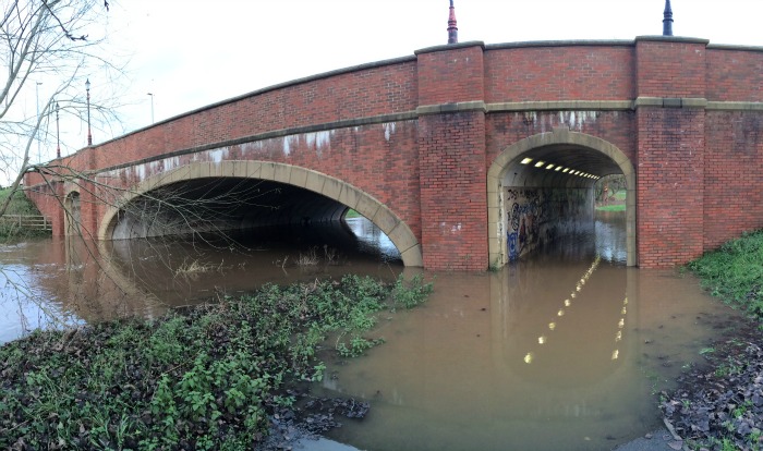 River Weaver swollen and floods footpaths in Nantwich