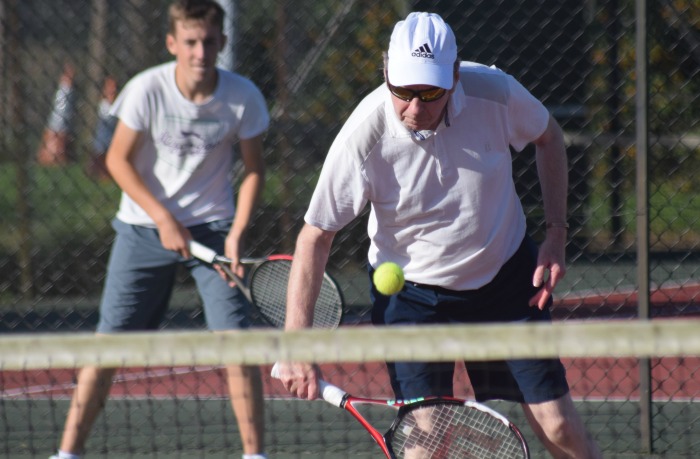 robert-sheffield-plays-a-volley-en-route-to-winning-the-mens-doubles-final-with-george-raiswell