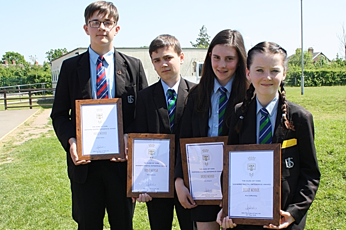 Robert Shuker, Will Maddocks, Izzy Simpson and Eliza Cliffe-Kirby proudly show their new certificates