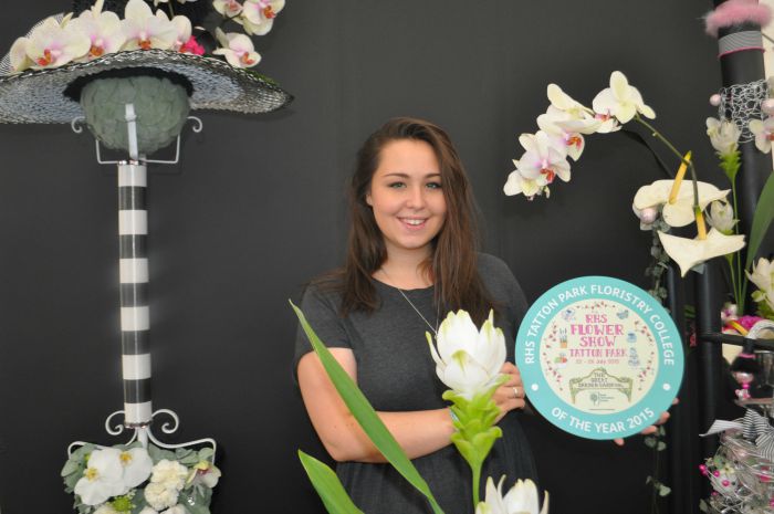 RHS Flower Show - Reaseheath College's Robyn Longden with Floristry College of Yr trophy