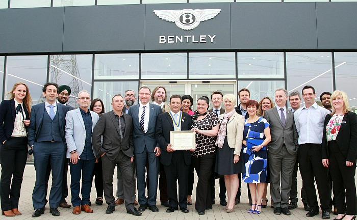 Rotary Club of Bentley Cheshire members are seen at the Charter presentation at the car showroom in Crewe