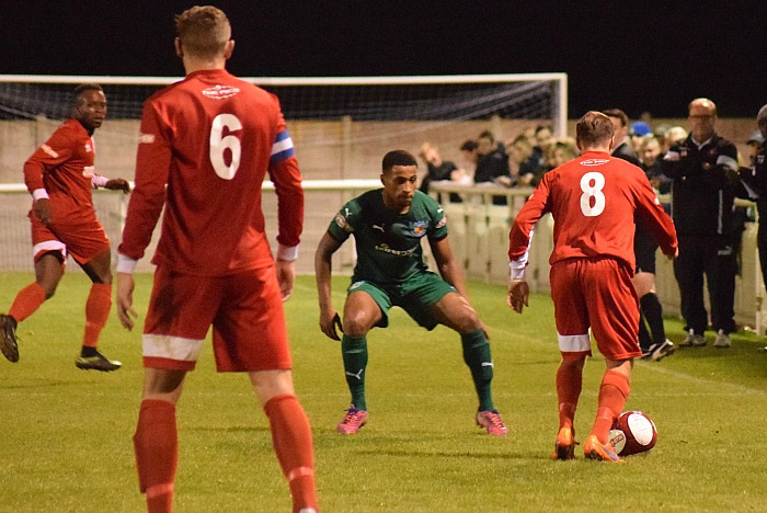 rushalls-luke-bottomer-on-the-ball-watched-by-ntfc-first-team-manager-phil-parkinson-and-assistant-manager-neil-sorvel