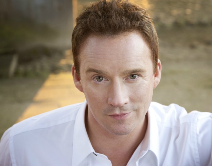 Russell Watson white shirt