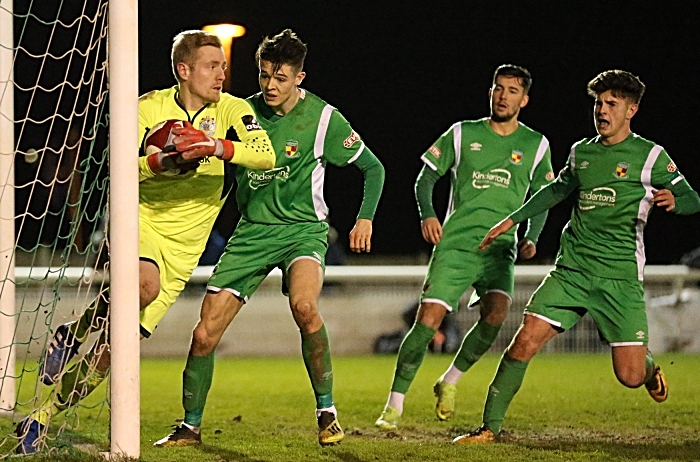 Second-half - Dabbers players pressurise Stockport keeper Ian Ormson (1)