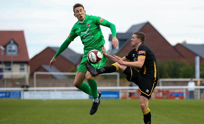 Second-half - Dan Cockerline rises for the ball (1)