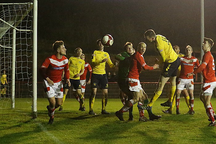 Second-half-David Forbes heads at goal