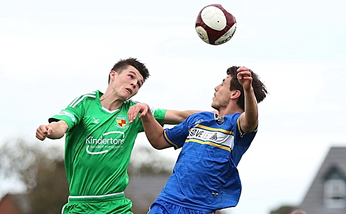 Second-half - Joe Malkin challenges for the ball (1)