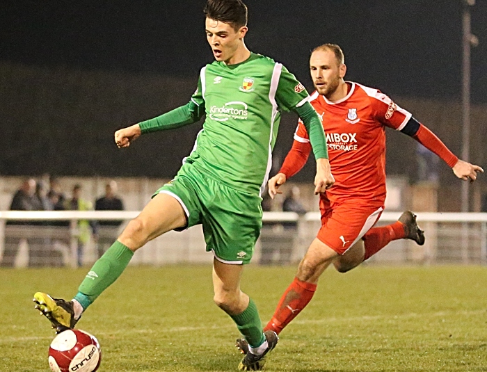 Second-half - Joe Malkin controls the ball under pressure (1)