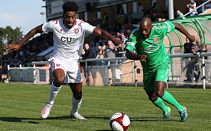 Second-half - Joe Mwasile fights for the ball (1)