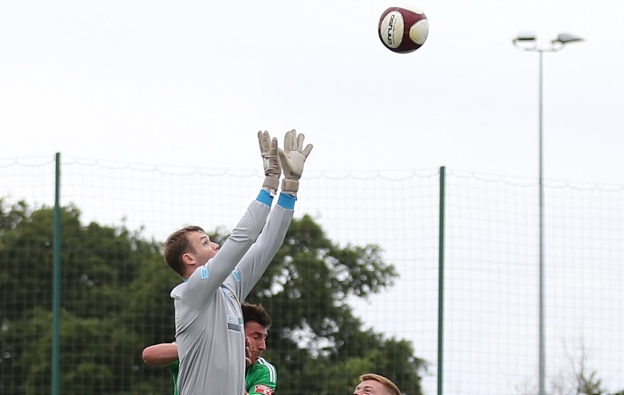 Second-half - Leek Town keeper reaches for the ball under pressure from Ben Harrison (1)