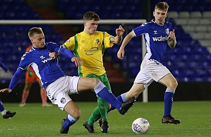 Second-half - Nantwich Town fight for the ball v Oldham