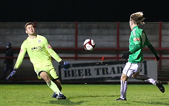 Second-half - fifth Nantwich goal - Luke Walsh lifts the ball over the rushing keeper