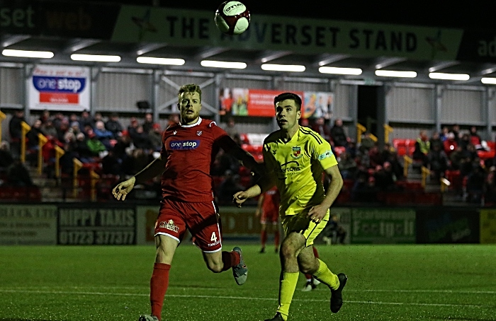 Second-half - opposition players eye the ball (1)