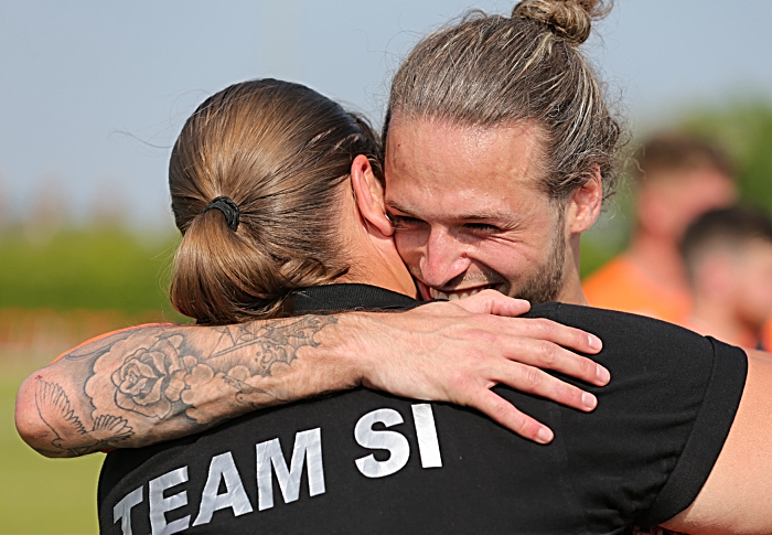 Si Everall embraces Gareth Jones sister - Davina Jones - after the match