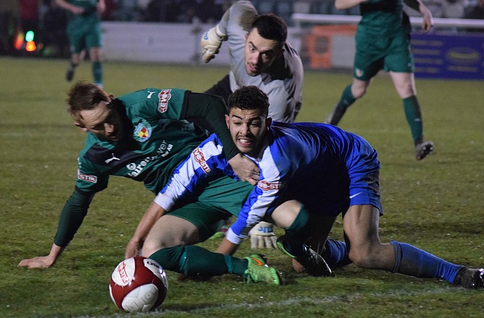 Steve Jones scrambles for the ball v Frickley