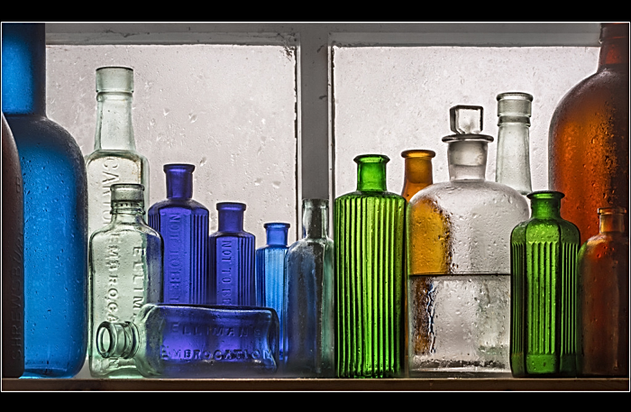 Still Life - Glass Bottles by Wray Douglas